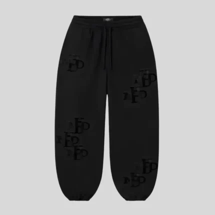 Black relaxed fit sweatpants with tonal black letter graphics, drawstring waistband and elastic cuffed ankles.