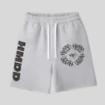 HMDD white graphic sweat shorts with vertical lettering and hand-drawn circular artwork
