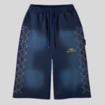 Navy blue relaxed-fit sweatpants featuring multicolor rhinestone-style embellishments along both outer legs and a small gold graphic on the upper thigh.