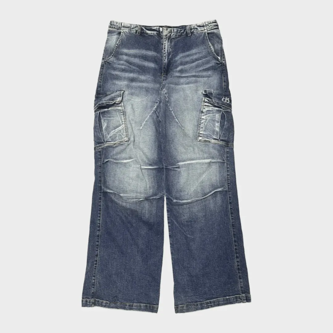 18 Blue baggy cargo jeans with washed denim, large utility side pockets, layered knee panels and relaxed wide-leg fit.