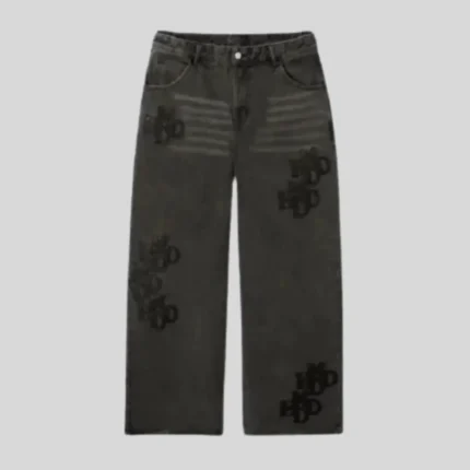 Black relaxed straight-leg sweatpants featuring subtle tonal graphic detailing across both legs, faded upper-leg accents, front pockets and a structured waistband.