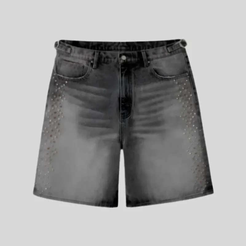 Black denim shorts with classic five-pocket construction and rhinestone-style embellished detailing along both front sides.