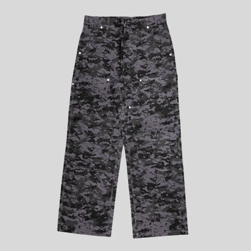 Grey and black digital camouflage cargo pants with relaxed wide-leg fit, utility pocket detailing and structured seams.