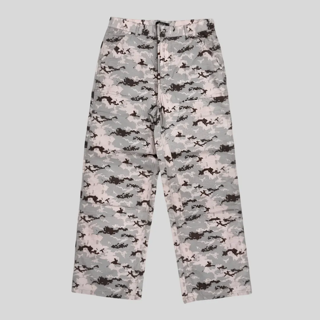 24 Grey digital camouflage pants with pixelated black and charcoal camo pattern and relaxed wide-leg streetwear fit.