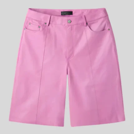 Vibrant pink denim shorts with classic five-pocket construction, belt loops, button closure, zipper fly and relaxed straight-leg silhouette.