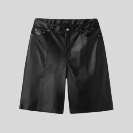 Black glossy denim shorts with classic five-pocket styling, belt loops, button and zip closure, and relaxed streetwear silhouette.
