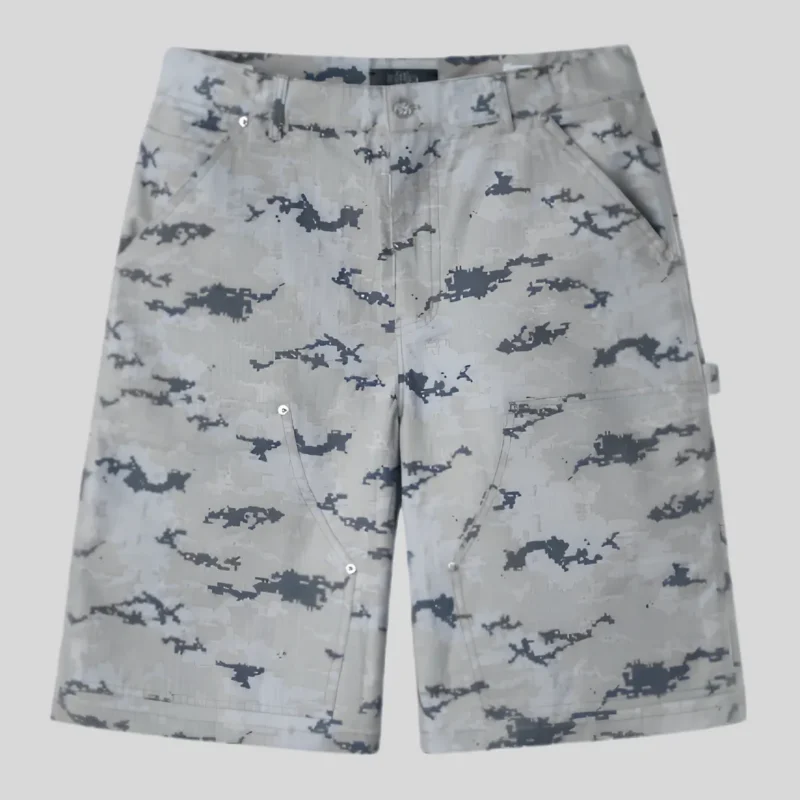 Grey and white abstract camouflage cargo denim shorts with belt loops, front pockets, utility detailing, button closure and relaxed streetwear fit.