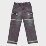 Dark brown distressed utility jeans with layered patchwork panels, contrasting beige bands, curved trim details, belt loops, front pockets and relaxed straight-leg fit.