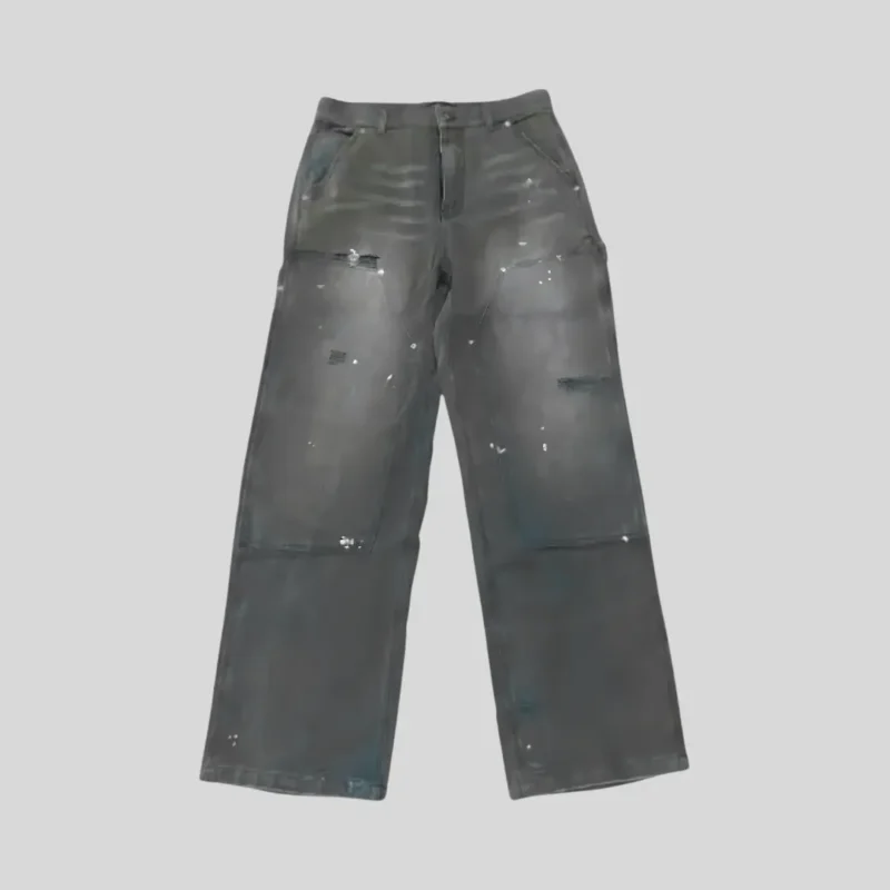 Dark grey distressed jeans featuring faded wash effects, scattered light paint-splatter details, abrasion accents and a relaxed straight-leg silhouette.