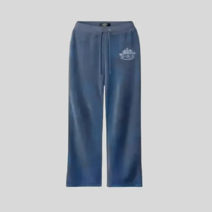Deep blue relaxed-fit sweatpants with adjustable drawstring waist and subtle light graphic detail on the upper leg.